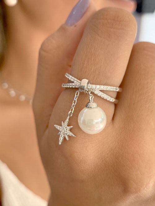 Anel perola zirconia branca estrela 8 pontas pendurada aro19