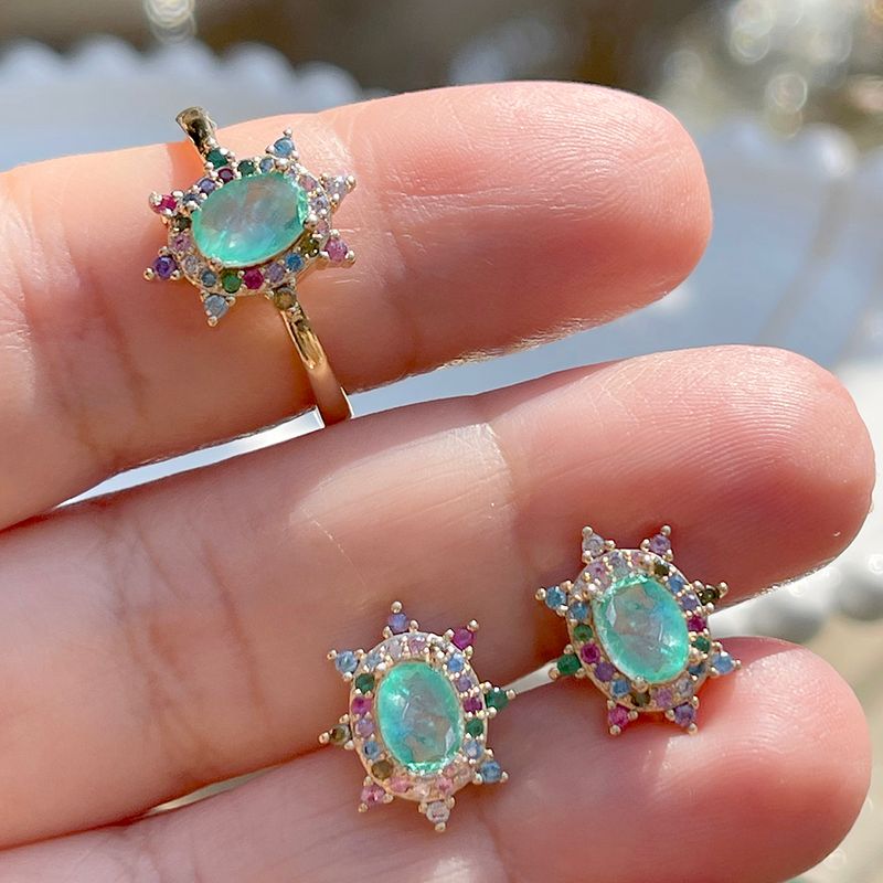 Anel-Oval-Cravejado-Fusion-Esmeralda-Colombiana-Banho-de-Ouro-18K