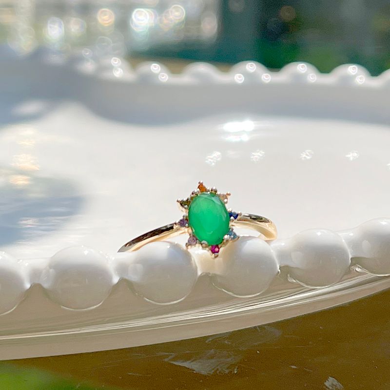 Anel-Oval-Cravejado-Cristal-Esmeralda-Banho-de-Ouro-18K-