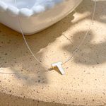 COLAR-FOLHEADO-LISO-LETRA-T-NYLON-42CM