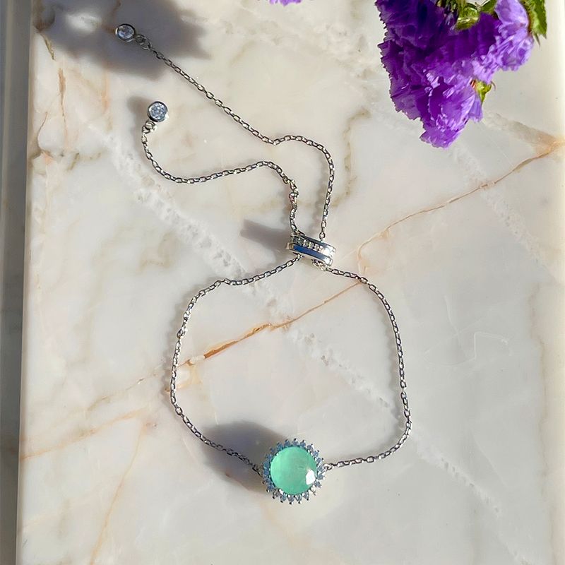 Pulseira-Fusion-Esmeralda-Colombiana-Redondo-com-Cravacao-em-Garras-Prata-925-