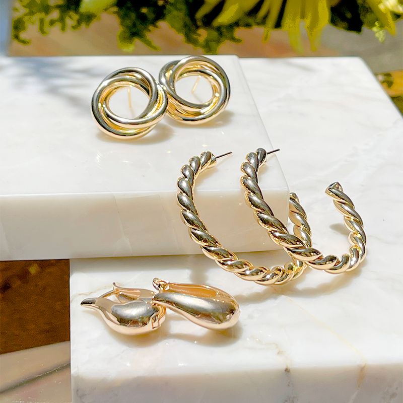 Brinco-Argola-Entrelacada-Lisa-Banho-de-Ouro-18K