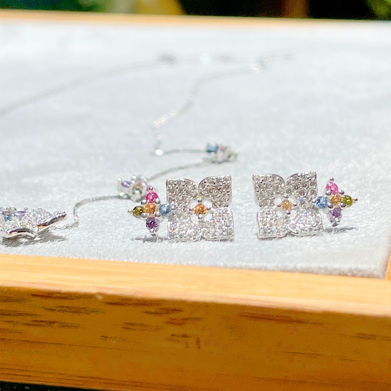 Brinco-Cristal-Ametista-Azul-Florzinha-Cravada-Em-Garras