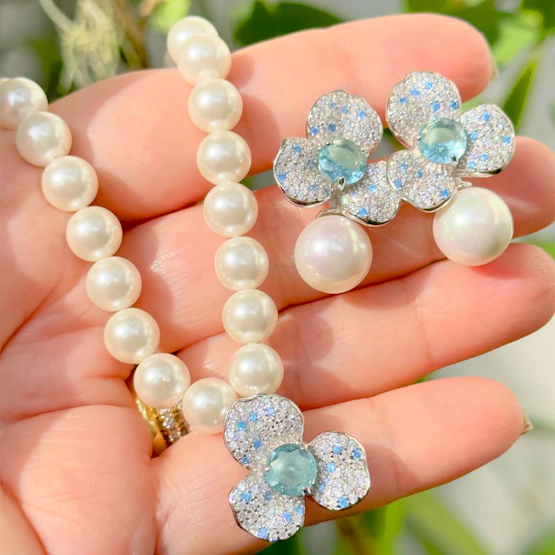 Brinco-perola-shell-flor-de-cristal-de-topazio-azul-prata-925-