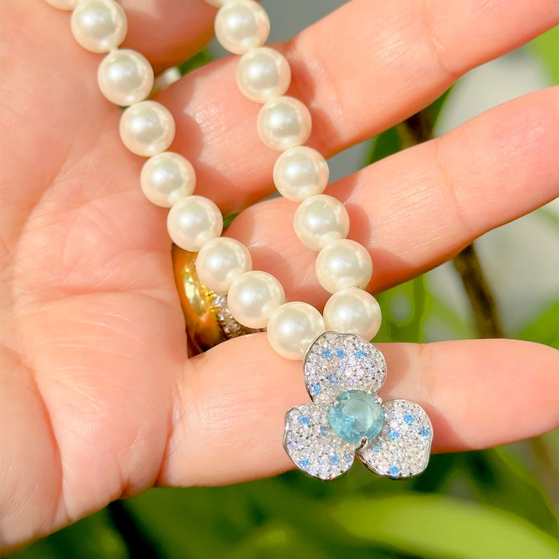 Colar-perola-shell-flor-de-cristal-topazio-azul-prata-925