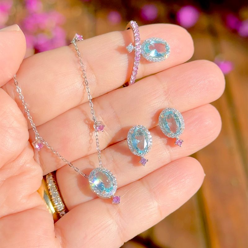 Anel-oval-cristal-topazio-azul-prata-925