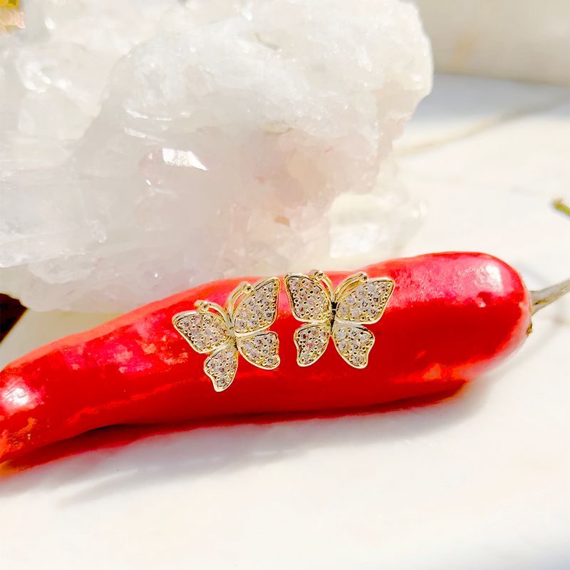 Brinco-borboleta-zirconia-branca-banho-de-ouro-18k-nano-gold-