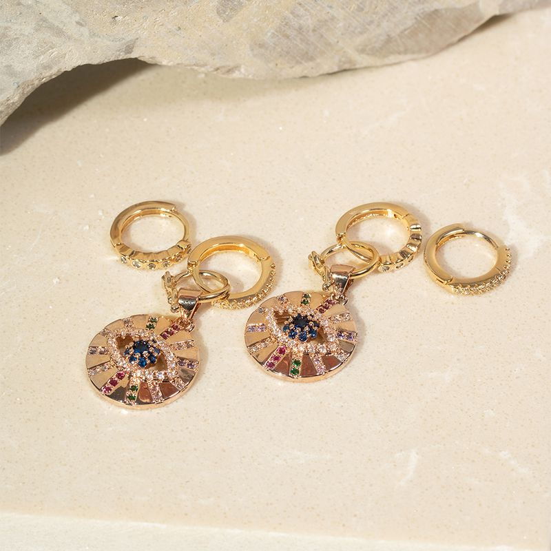 Brinco-ear-bling-cravacao-inglesa-medalha-de-olho-zirconia-colorida-banho-de-ouro-rose