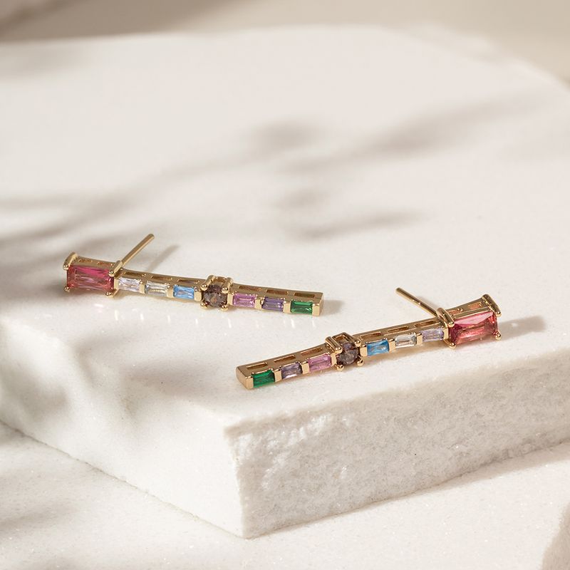 Brinco-palito-medio-cristal-topazio-azul-banho-de-ouro-18k-
