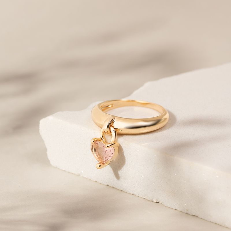 Anel-coracao-pendurado-cristal-quartzo-rosa-banho-de-ouro-18k