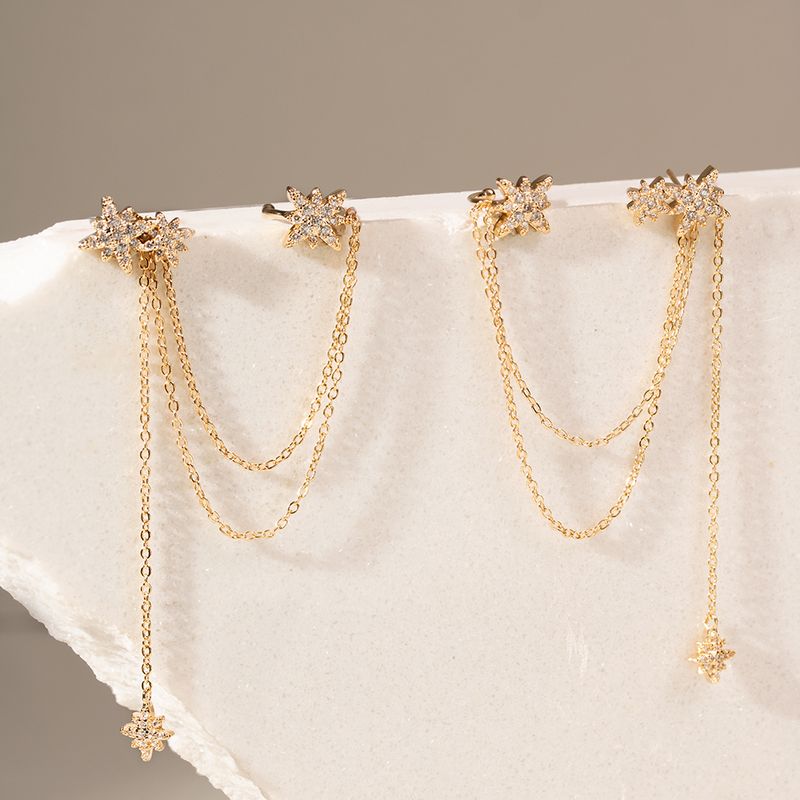 Brinco-ear-chain-duplo-estrelas-banho-de-ouro-18k