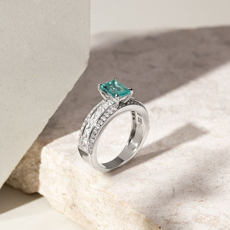 Anel-solitario-quadrado-cristal-paraiba-aro-cravejado-zirconias-brancas-em-prata-925