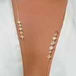 Colar-zirconia-longo-com-simbolos-banhado-a-ouro-18k
