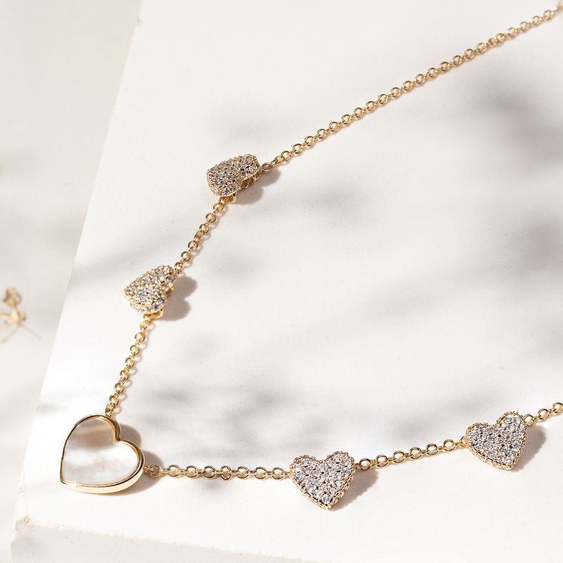 Colar-Coracao-Madreperola-5-Coracoes-Cravejados-Banhado-a-Ouro-18k-50cm