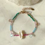 Pulseira-fio-cristal-topazio-azul-perola-barroca-19cm-banho-de-ouro-18k