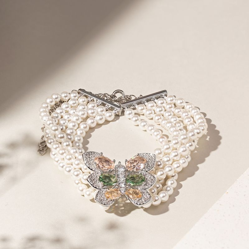 Pulseira-Borboleta-de-Fios-com-Perola-Shell-e-Cristais-de-Morganita-e-Ametista-Verde---15cm---8cm-de-Alongador---Banho-de-Rodio-Branco