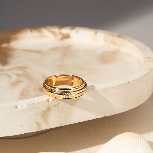 Anel Aliança Giratória com Ponto de Luz de Zircônia Branca - Banho de Ouro 18k